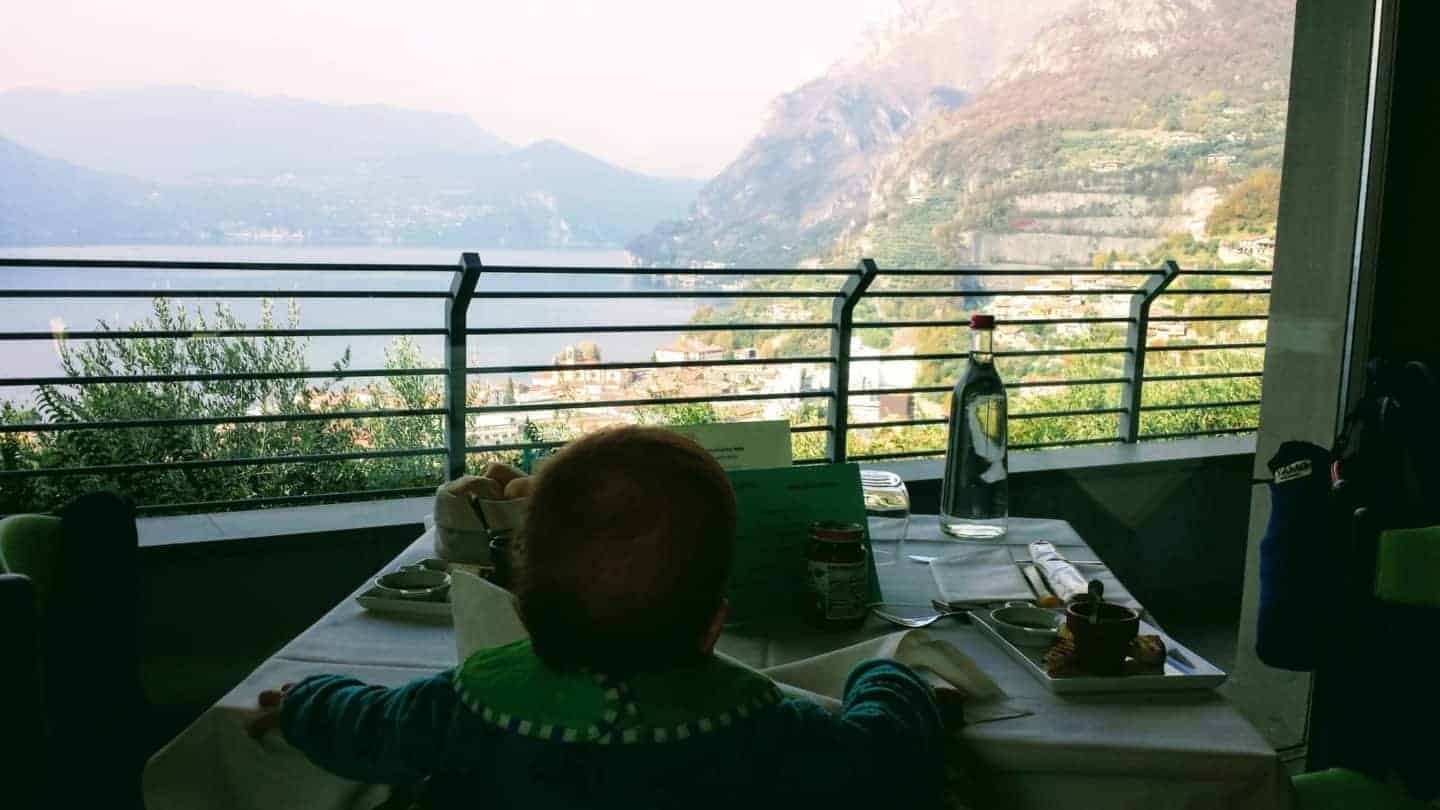 Baby in a restaurant with a view